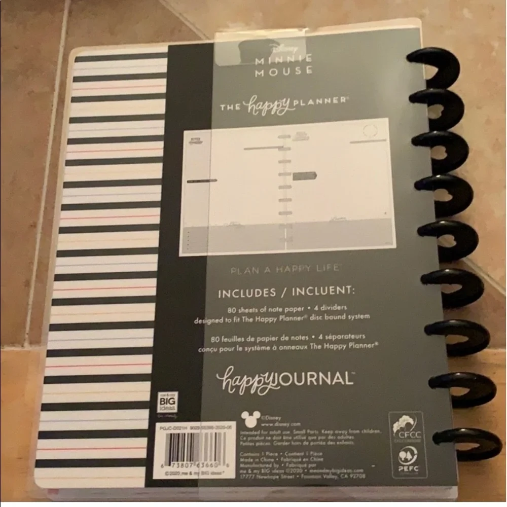 The Happy Planner Minnie Mouse Graphic Budget Classic Guided Journal.